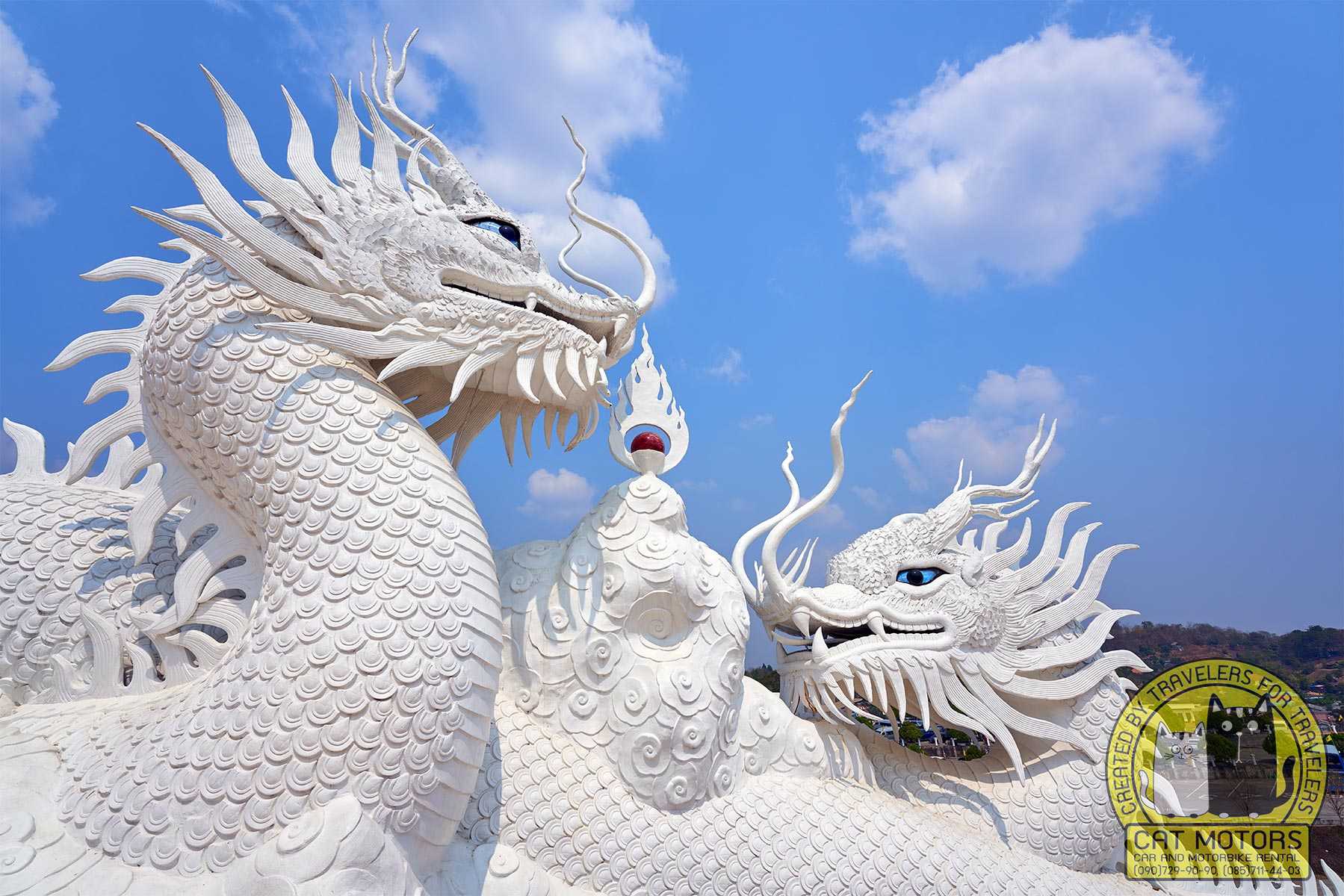 Sculptures Of White Dragons Decorating The Stairs Leading To The Temple